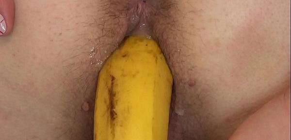  Lesbian fucks pregnant girlfriend doggystyle, hairy pussy pushes banana after orgasm.